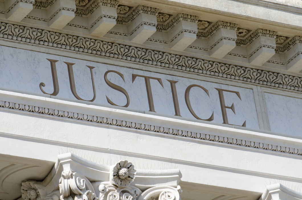 justice engraved on courthouse